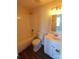 Bathroom featuring vanity with sink, toilet and shower, with white tile at 8224 Golf Ridge Dr, Charlotte, NC 28277
