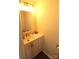 Bathroom featuring a modern vanity and mirror at 8224 Golf Ridge Dr, Charlotte, NC 28277