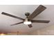 Modern ceiling fan with light fixture, adding style and functionality to the room at 8224 Golf Ridge Dr, Charlotte, NC 28277