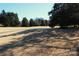 Enjoy the community greenspace with walking path, perfect for outdoor recreation at 8224 Golf Ridge Dr, Charlotte, NC 28277