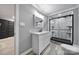 Modern bathroom with stylish vanity, shower featuring tile walls and a sleek glass door at 836 Love Rd, Blackstock, SC 29014