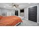 This spacious bedroom features an accent wall, a ceiling fan, and multiple closets and doors at 836 Love Rd, Blackstock, SC 29014