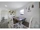 Cozy dining room with natural light, a wood table, and decorative wall hangings at 836 Love Rd, Blackstock, SC 29014