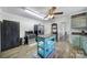 Cozy kitchen features stainless steel appliances and a charming turquoise island at 836 Love Rd, Blackstock, SC 29014