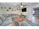 Living room featuring neutral walls, a ceiling fan and a large sectional sofa at 836 Love Rd, Blackstock, SC 29014