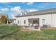 The home features a backyard patio and outdoor living area at 8513 Loxton Cir, Charlotte, NC 28214
