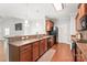 Gourmet kitchen featuring granite countertops, a breakfast bar, and modern appliances for culinary enthusiasts at 8513 Loxton Cir, Charlotte, NC 28214