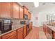 Modern kitchen featuring granite countertops, stainless steel appliances, and plenty of cabinet storage at 8513 Loxton Cir, Charlotte, NC 28214