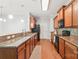 Well-equipped kitchen boasts granite countertops, stainless steel appliances, and ample cabinet space at 8513 Loxton Cir, Charlotte, NC 28214