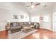 Comfortable living room featuring a vaulted ceiling and hardwood floors, perfect for relaxation and entertaining at 8513 Loxton Cir, Charlotte, NC 28214
