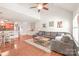 Spacious living room open to the kitchen and dining area, creating a seamless flow for modern living at 8513 Loxton Cir, Charlotte, NC 28214