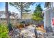 Secluded backyard with a gravel groundcover, stone bench, and a tranquil, garden-like setting at 8929 Bryant Field Cir, Charlotte, NC 28277