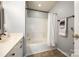 Bathroom featuring a tub and shower combination with tile surround and vanity with sink at 8929 Bryant Field Cir, Charlotte, NC 28277