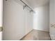 Walk-in closet features neutral carpet, white walls, and metal shelving at 8929 Bryant Field Cir, Charlotte, NC 28277