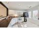 Functional kitchen featuring white cabinets and stainless steel appliances at 8929 Bryant Field Cir, Charlotte, NC 28277
