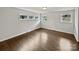 Cozy bedroom with hardwood floors and windows providing natural light at 924 Springdale Ln, Gastonia, NC 28052