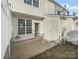 Back patio features a concrete floor, and a white fence at 928 Copperstone Ln, Fort Mill, SC 29708