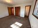 Bedroom featuring natural light from window, a closet, and neutral walls at 95 Icard Ridge Road Ext, Granite Falls, NC 28630