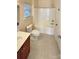 Bright bathroom featuring a tub-shower combination and a clean, neutral color palette and tile flooring at 9503 Rocky Spring Nw Ct, Concord, NC 28027