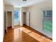 Bedroom with hardwood floors, two closets and multiple windows for natural light at 9503 Rocky Spring Nw Ct, Concord, NC 28027