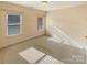 Neutral bedroom with three sunny windows at 9503 Rocky Spring Nw Ct, Concord, NC 28027