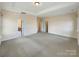 Spacious main bedroom with neutral walls and carpeted floors at 9503 Rocky Spring Nw Ct, Concord, NC 28027