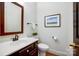 Well-maintained bathroom featuring a modern sink, vanity, and fixtures at 10207 Rattersly Ct, Charlotte, NC 28277