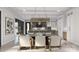 Elegant dining room with modern lighting, stylish chairs, and an open view to the kitchen at 1025 Maxwell Ct # 7, Marvin, NC 28173