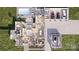 Aerial view of home featuring a pool, multiple seating areas, a large garage, and well-manicured landscaping at 1057 Maxwell Ct # 13, Marvin, NC 28173