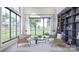 Cozy living room with large windows offering scenic outdoor views, comfortable seating, and stylish decor at 1057 Maxwell Ct # 13, Marvin, NC 28173