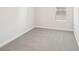 Carpeted bedroom with window and outlets at 114 Ciara Pl # A, Mooresville, NC 28117