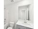 Bathroom featuring a bathtub, toilet, and sink with mirror, providing a functional and clean space at 114 Ciara Pl # C, Mooresville, NC 28117