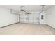Spacious two car garage featuring an automatic door and plenty of space for parking and storage at 114 Ciara Pl # C, Mooresville, NC 28117
