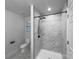 Stylish bathroom with a sleek walk-in shower and modern marble tiling at 118 W Lee Ave, Bessemer City, NC 28016