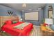 Stylish bedroom with a rustic wooden bed frame and a cozy, inviting ambiance at 121 Inlet Point Dr, Tega Cay, SC 29708