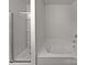 Bathroom features a glass-enclosed shower and a separate soaking tub at 121 Woodbridge Cir, Mount Holly, NC 28120