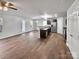Open-concept space with kitchen, dining, and living areas at 121 Woodbridge Cir, Mount Holly, NC 28120