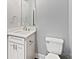 Bright bathroom with white vanity, quartz countertop, sink, faucet and toilet at 1210 Aragon Beach Rd, Rock Hill, SC 29732