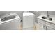 Modern laundry room with new washer, dryer and sink at 1210 Aragon Beach Rd, Rock Hill, SC 29732