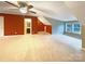 Spacious bonus room with neutral carpet, ample natural light, and a full bathroom at 13217 Reunion St, Charlotte, NC 28278