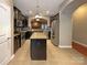 Modern kitchen with stainless steel appliances, granite countertops, and a functional island at 13217 Reunion St, Charlotte, NC 28278