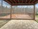 Outdoor patio with a wooden pergola, railing, and stone flooring at 13217 Reunion St, Charlotte, NC 28278