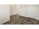 Neutral hallway with luxury vinyl plank flooring and access to other rooms at 138 Aberdeen Dr, Salisbury, NC 28144
