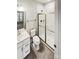 Modern bathroom featuring a sleek shower, a toilet, and a vanity with a sink at 144 Tetcott St, Mooresville, NC 28115