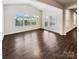 Bright dining room with hardwood floors, recessed lights, and backyard access at 144 Tetcott St, Mooresville, NC 28115