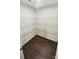 Walk-in pantry features shelving for ample storage and hardwood floors at 144 Tetcott St, Mooresville, NC 28115