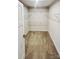 A well-organized walk-in closet featuring multiple shelves and neutral carpeting at 144 Tetcott St, Mooresville, NC 28115