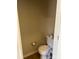 Small half-bathroom showcasing a standard toilet and basic fixtures at 15200 Chowning Tavern Ln, Charlotte, NC 28262