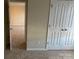 Bedroom with closet and carpeted floors at 15200 Chowning Tavern Ln, Charlotte, NC 28262