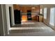 Bright kitchen with stainless steel appliances, wooden cabinets, and modern flooring at 15200 Chowning Tavern Ln, Charlotte, NC 28262
